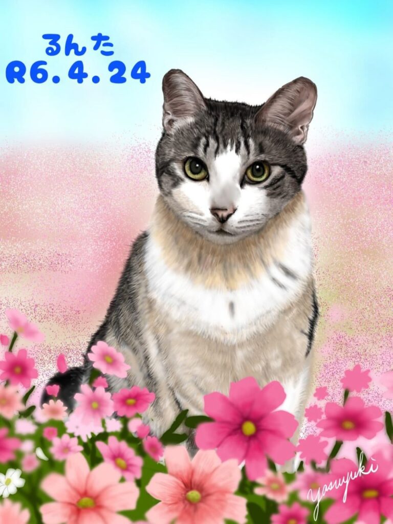ピンクの花に囲まれた猫