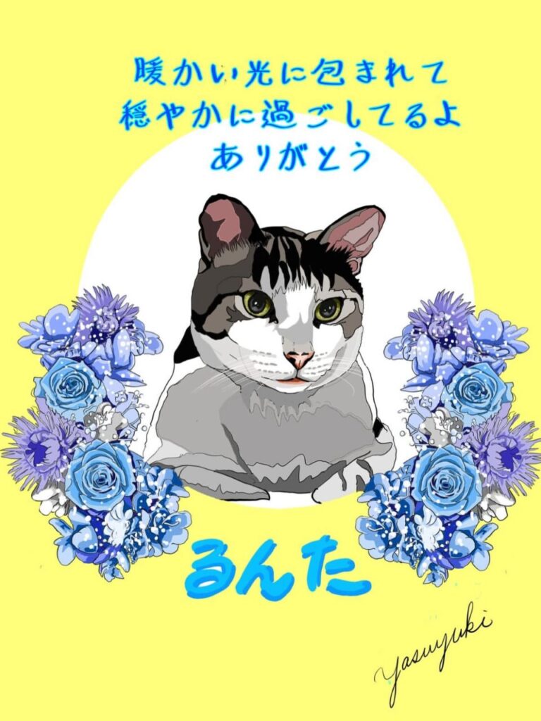 ブルー系の花に囲まれた猫